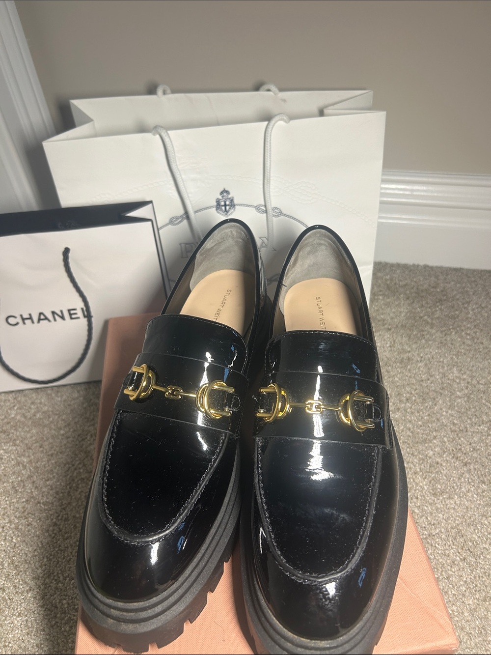 Stuart Weitzman Black Patent Loafers with Gold Hardware